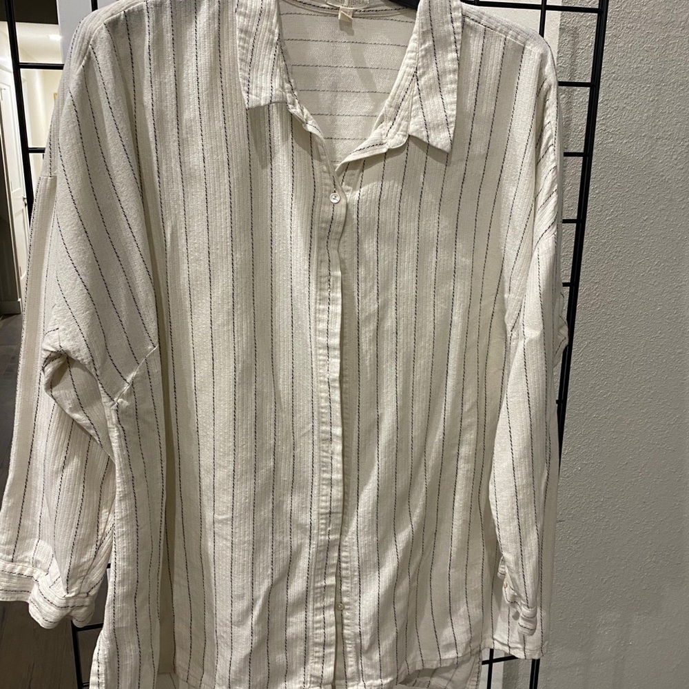 Cream colored button down shirt